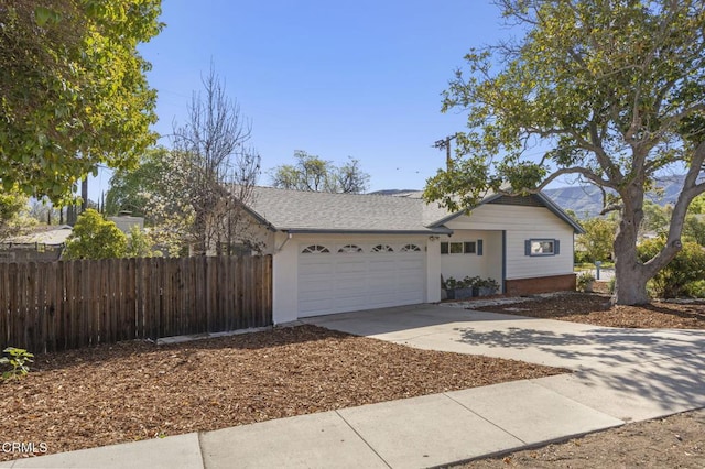406 Santa Ana St, Ojai, CA 93023 - view of front of property with an attached garage, driveway, and a shingled roof