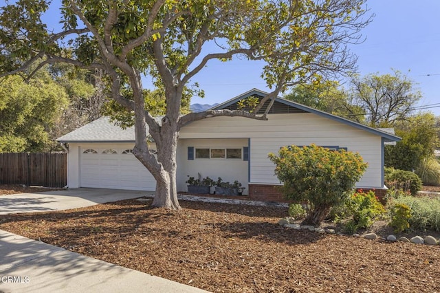 406 Santa Ana St, Ojai, CA 93023 - view of front of home featuring concrete driveway, a garage, and brick siding
