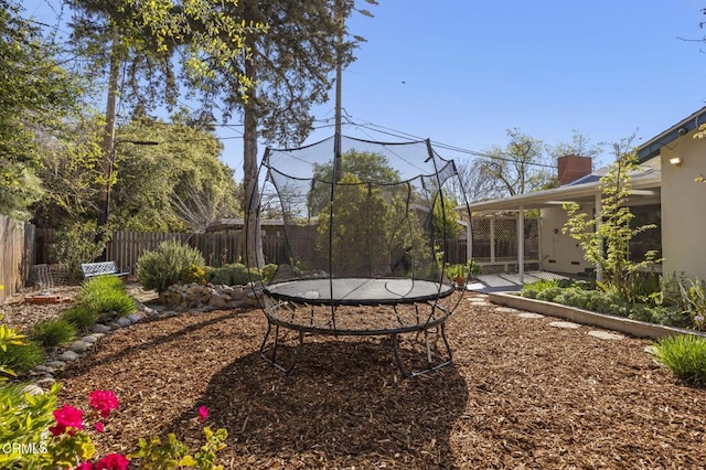 406 Santa Ana St, Ojai, CA 93023 - fenced backyard featuring a trampoline and a patio area