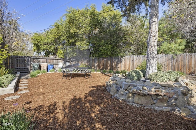406 Santa Ana St, Ojai, CA 93023 - fenced backyard featuring a trampoline