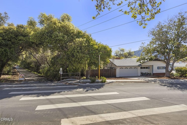 406 Santa Ana St, Ojai, CA 93023 - view of front of house featuring a garage and driveway