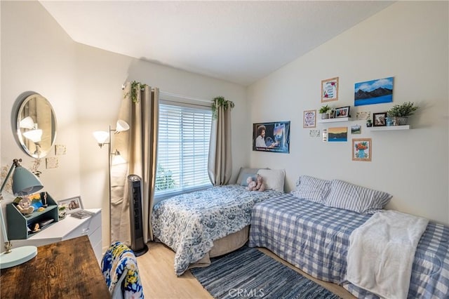28331 Seco Canyon Rd Unit 119, Saugus, CA 91390 - bedroom with vaulted ceiling and light wood-style floors