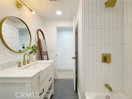 109 S San Antonio Ave, Upland, CA 91786 - bathroom featuring vanity, tile patterned floors, bathtub / shower combination, and recessed lighting