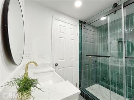 109 S San Antonio Ave, Upland, CA 91786 - full bathroom with vanity, a shower stall, and recessed lighting