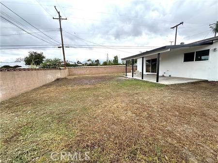 109 S San Antonio Ave, Upland, CA 91786 - fenced backyard featuring a patio area