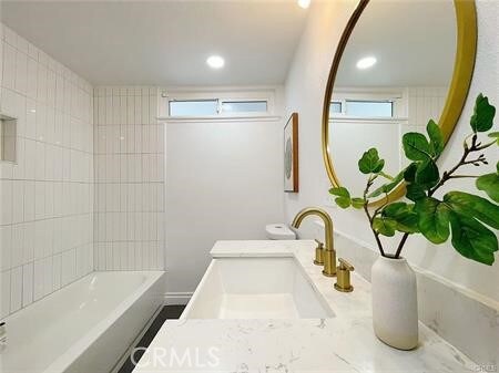 109 S San Antonio Ave, Upland, CA 91786 - full bath with recessed lighting, vanity, and plenty of natural light