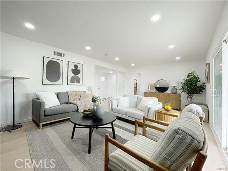 109 S San Antonio Ave, Upland, CA 91786 - living area featuring light wood finished floors and recessed lighting