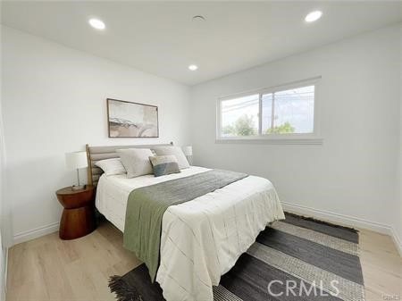 109 S San Antonio Ave, Upland, CA 91786 - bedroom with light wood-style floors and recessed lighting