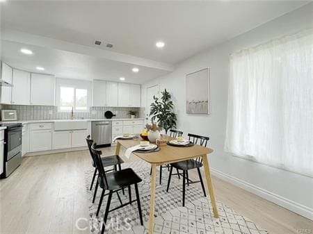 109 S San Antonio Ave, Upland, CA 91786 - dining area featuring light wood-style floors and recessed lighting