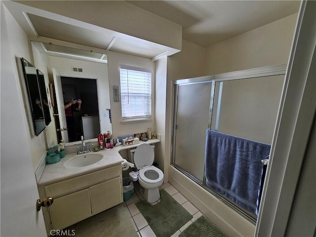 14001 Rabbit Rd, Sylmar, CA 91342 - full bathroom with vanity, tile patterned floors, and enclosed tub / shower combo