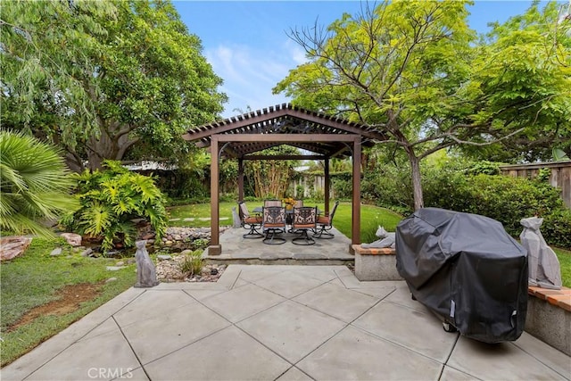 129 Five Crowns Way, Encinitas, CA 92024 - fenced backyard featuring a pergola, a patio, area for grilling, and outdoor dining space