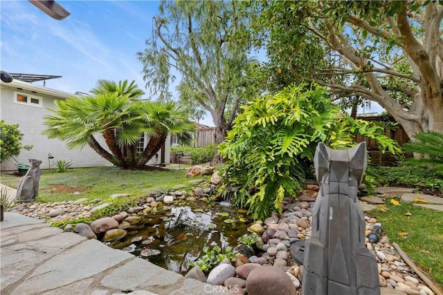 129 Five Crowns Way, Encinitas, CA 92024 - view of yard with a garden pond