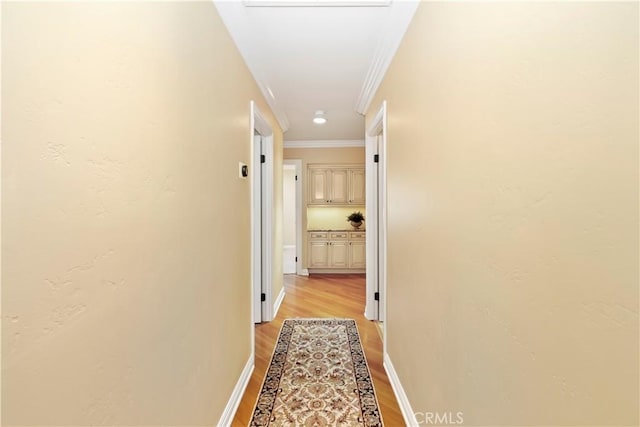 129 Five Crowns Way, Encinitas, CA 92024 - hall featuring light wood-style floors and crown molding