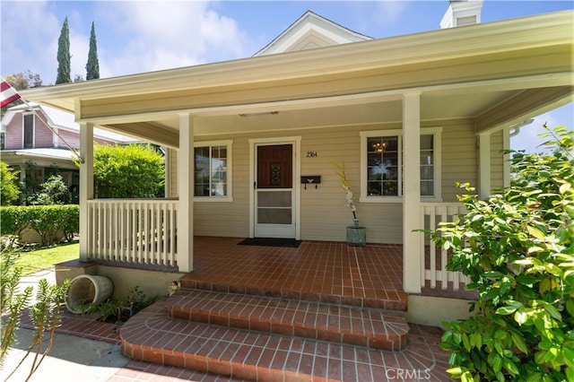 2364 6th St, La Verne, CA 91750 - doorway to property with a porch and a chimney