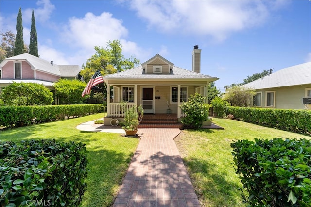 2364 6th St, La Verne, CA 91750 - bungalow-style house with a porch, a chimney, and a front lawn
