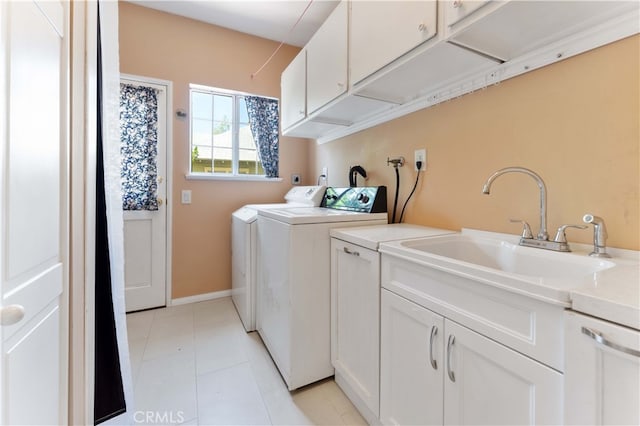 2364 6th St, La Verne, CA 91750 - washroom with cabinet space, washing machine and clothes dryer, and light tile patterned floors