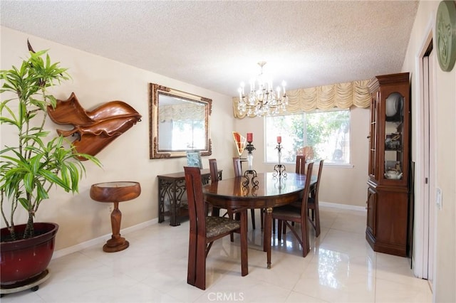 5295 Bronson Way, Riverside, CA 92506 - dining room featuring a chandelier, a textured ceiling, and light tile patterned floors