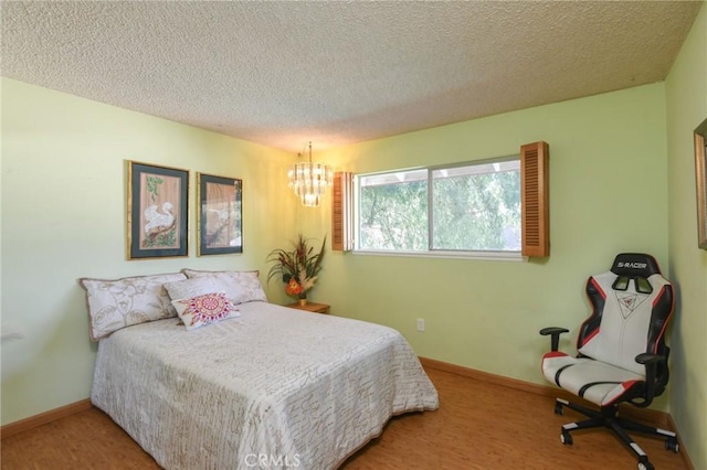 5295 Bronson Way, Riverside, CA 92506 - bedroom with a chandelier and a textured ceiling