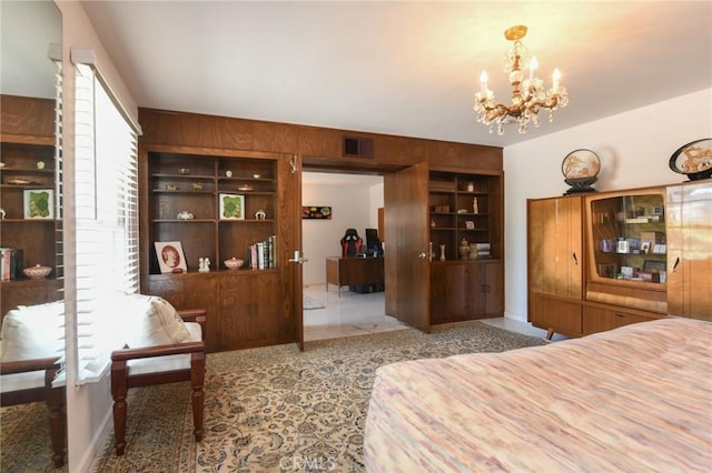 5295 Bronson Way, Riverside, CA 92506 - bedroom with a chandelier and wooden walls