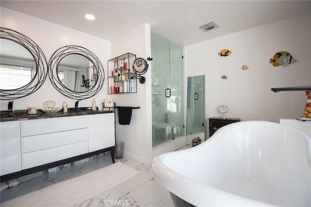5295 Bronson Way, Riverside, CA 92506 - bathroom with vanity, a stall shower, marble finish flooring, a freestanding tub, and recessed lighting