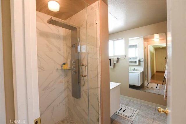 5295 Bronson Way, Riverside, CA 92506 - full bathroom with vanity, a marble finish shower, and tile patterned floors