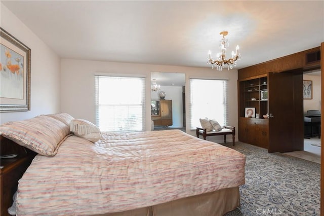 5295 Bronson Way, Riverside, CA 92506 - bedroom with a chandelier and carpet