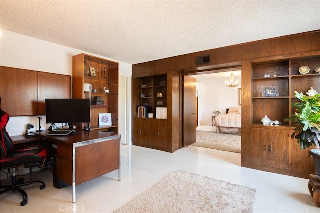 5295 Bronson Way, Riverside, CA 92506 - office with a textured ceiling and a chandelier