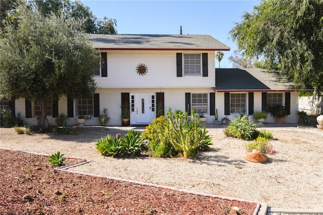 5295 Bronson Way, Riverside, CA 92506 - colonial-style house featuring brick siding