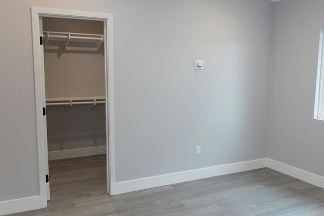 13233 Beechtree St, Lakeside, CA 92040 - unfurnished bedroom with a spacious closet, wood finished floors, and a closet