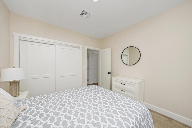 2103 Loquat Pl, Oceanside, CA 92054 - bedroom with wood finished floors and a closet