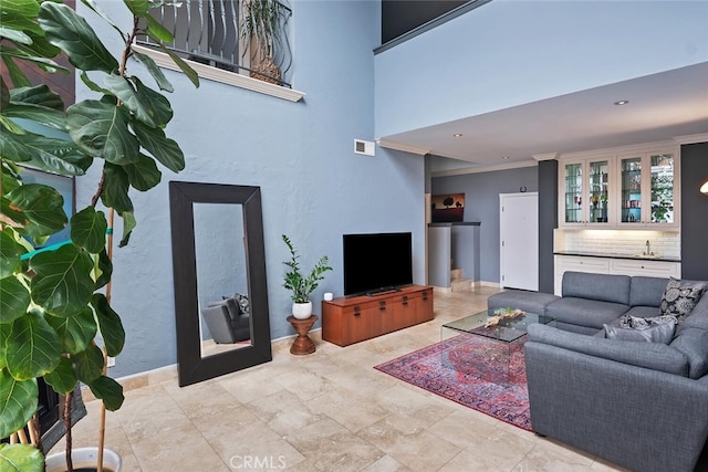 13331 Moorpark St Unit 316, Sherman Oaks, CA 91423 - living room featuring ornamental molding and baseboards