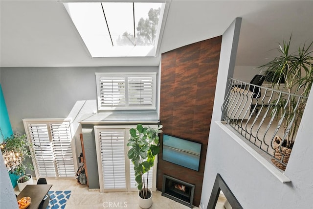 13331 Moorpark St Unit 316, Sherman Oaks, CA 91423 - foyer featuring a skylight and a warm lit fireplace