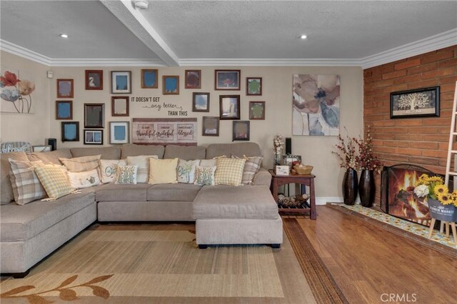 13520 Preciado Ave, Chino, CA 91710 - living room with crown molding, wood finished floors, beamed ceiling, and recessed lighting