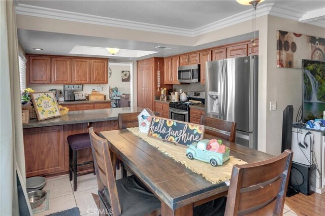 13520 Preciado Ave, Chino, CA 91710 - dining room with crown molding and light tile patterned floors