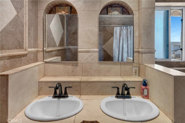 13520 Preciado Ave, Chino, CA 91710 - bathroom featuring double vanity and tile walls