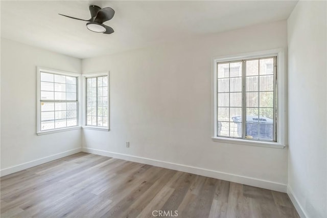 717 La Porte Ave, San Bernardino, CA 92405 - spare room featuring plenty of natural light, light wood-type flooring, and ceiling fan