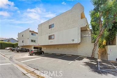 13080 Dronfield Ave Unit 80, Sylmar, CA 91342 - uncovered parking lot with stairs
