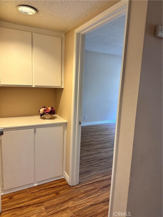 13080 Dronfield Ave Unit 80, Sylmar, CA 91342 - bar with a textured ceiling and wood finished floors