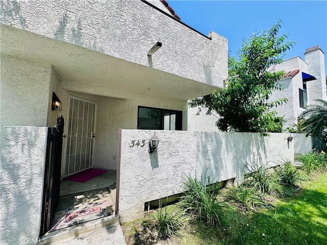 343 Park Shadow Ct, Baldwin Park, CA 91706 - view of property exterior with stucco siding
