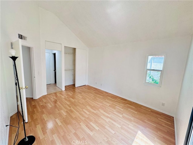 343 Park Shadow Ct, Baldwin Park, CA 91706 - unfurnished bedroom with vaulted ceiling and light wood-style floors