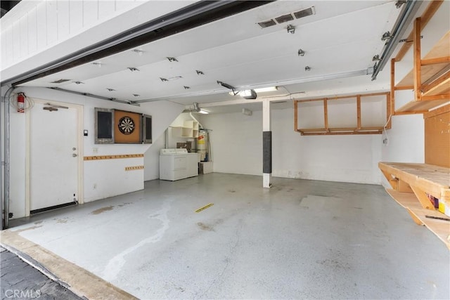1205 Las Arenas Way Unit 3, Costa Mesa, CA 92627 - garage with washing machine and clothes dryer, strapped water heater, and a garage door opener
