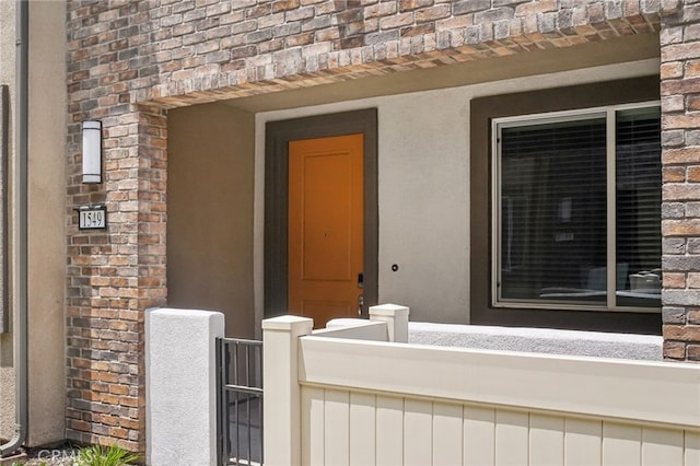1549 Stratus Dr, Pomona, CA 91768 - entrance to property featuring brick siding and stucco siding