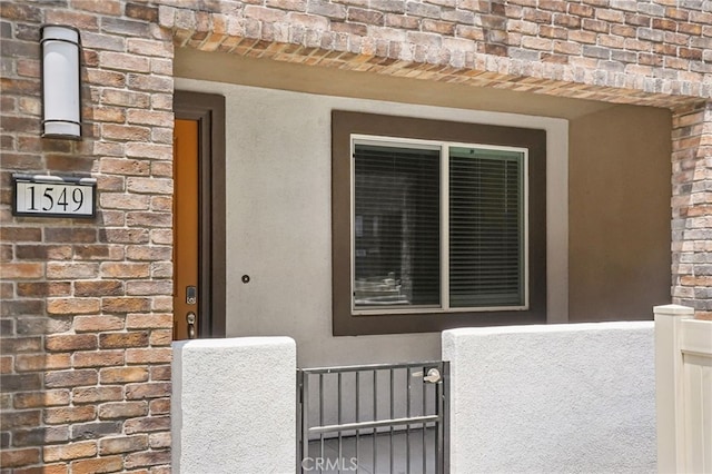 1549 Stratus Dr, Pomona, CA 91768 - entrance to property with brick siding and stucco siding