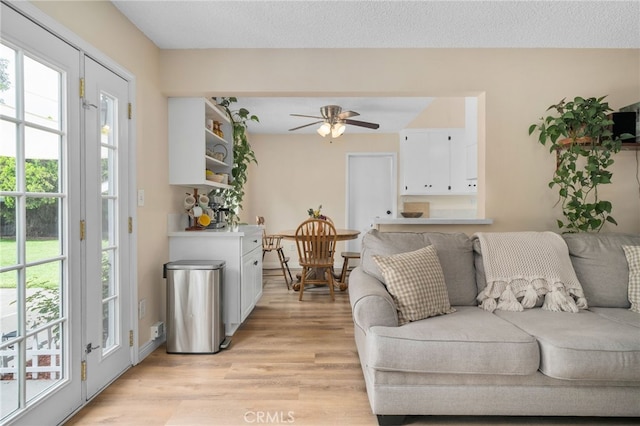 3542 Lillian St, Riverside, CA 92504 - living room featuring light wood-style flooring and a ceiling fan