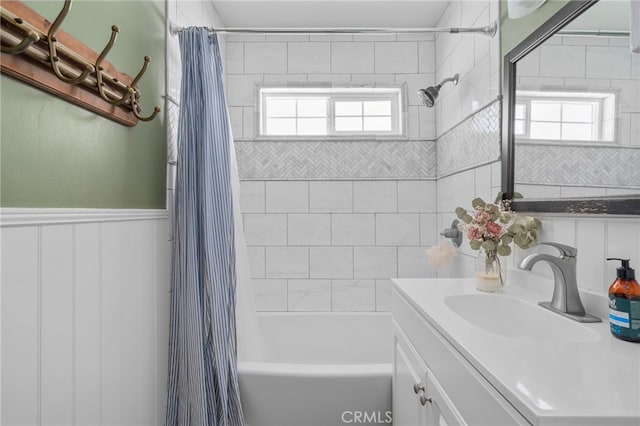 3542 Lillian St, Riverside, CA 92504 - full bathroom featuring shower / bath combo with shower curtain, vanity, and wainscoting