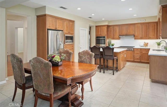 26860 Chaucer Pl, Stevenson Ranch, CA 91381 - dining area featuring light tile patterned floors and recessed lighting