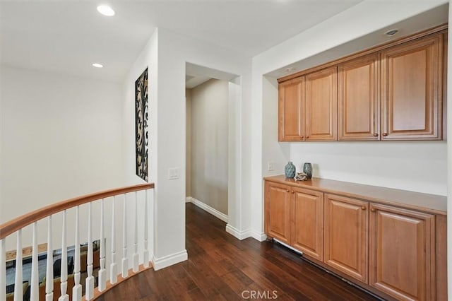 26860 Chaucer Pl, Stevenson Ranch, CA 91381 - hallway featuring dark wood-style flooring and recessed lighting