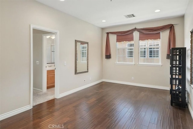 26860 Chaucer Pl, Stevenson Ranch, CA 91381 - spare room with dark wood-type flooring and recessed lighting