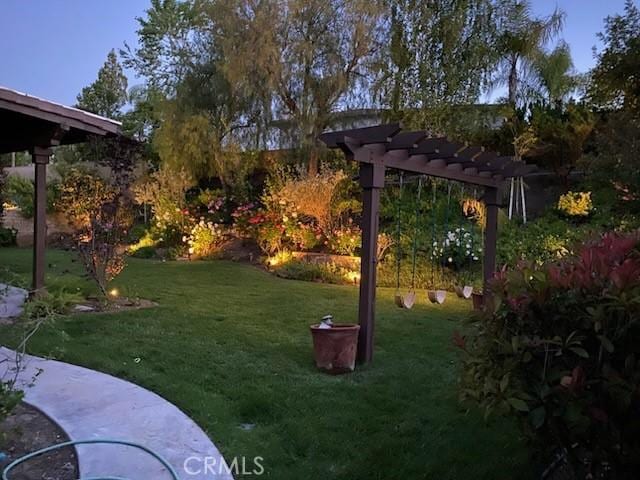 26860 Chaucer Pl, Stevenson Ranch, CA 91381 - view of grassy yard with a pergola