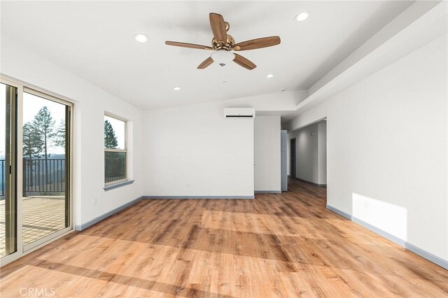 8412 Montna Dr, Paradise, CA 95969 - empty room featuring a wall mounted air conditioner, recessed lighting, light wood-style flooring, and ceiling fan